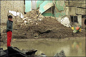 boy amidst rubble